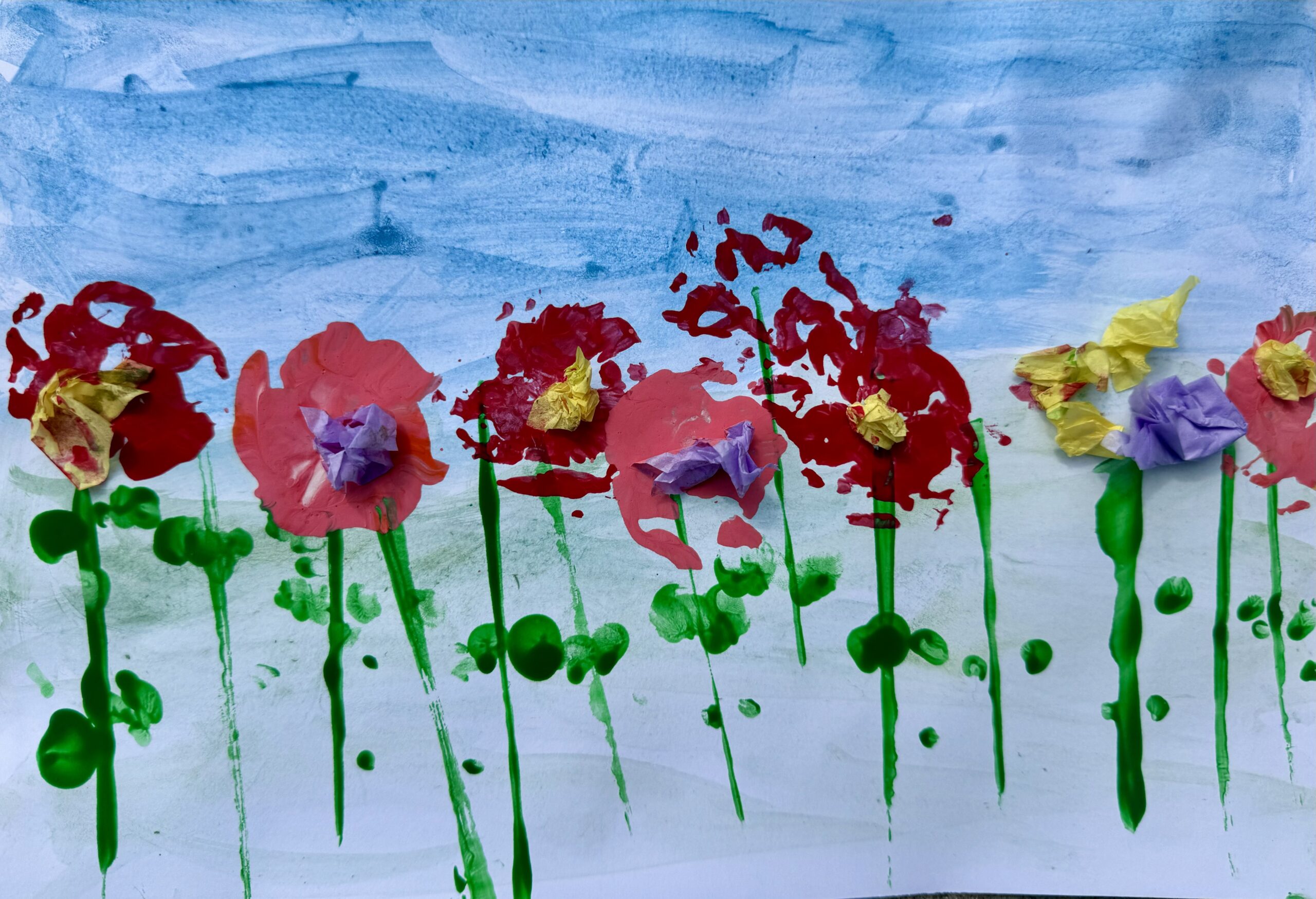 brightly coloured painting and collage of wildflowers