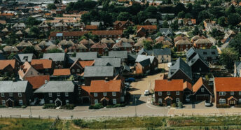 densely packed dwellings on what used to be open countryside