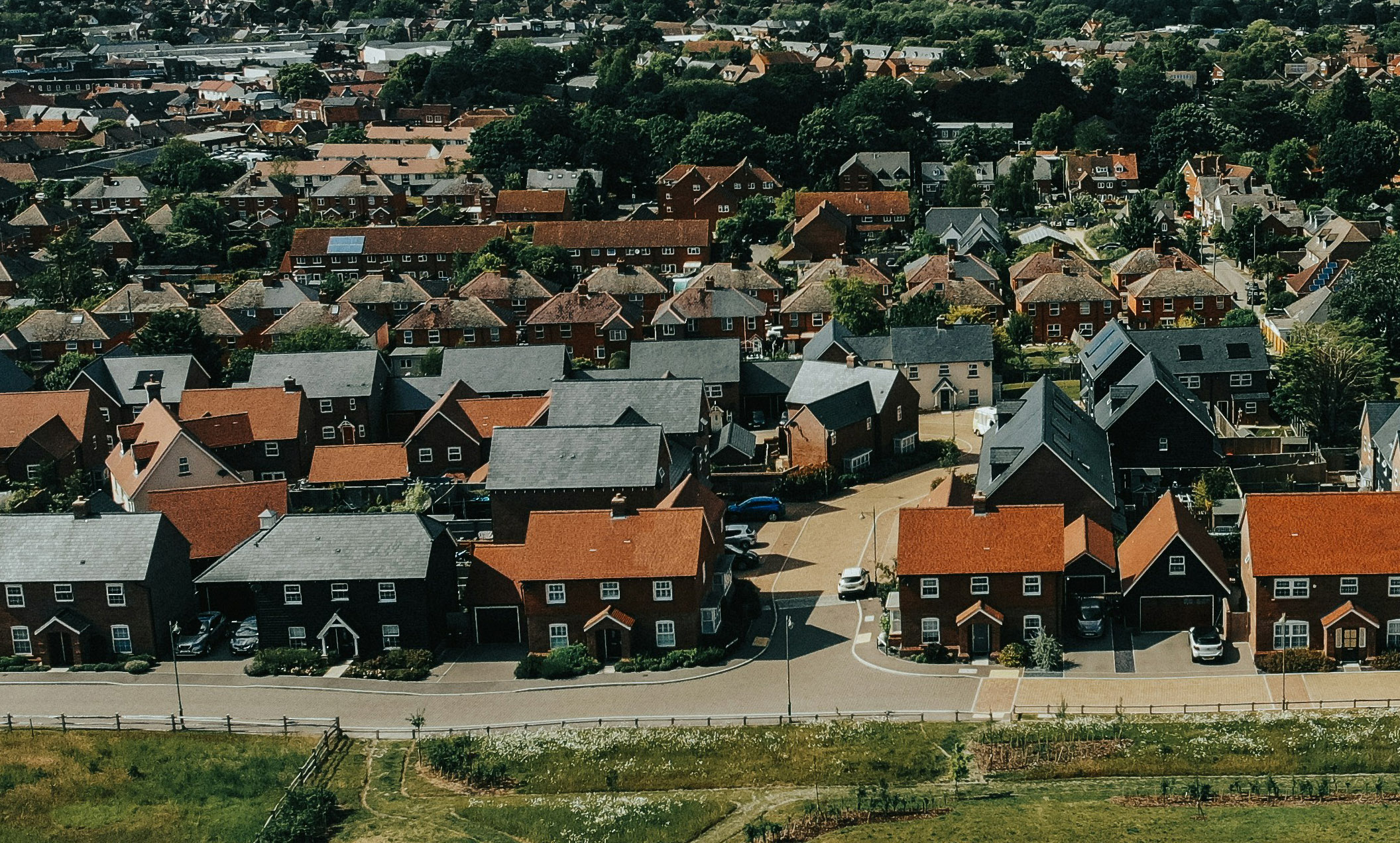 densely packed dwellings on what used to be open countryside